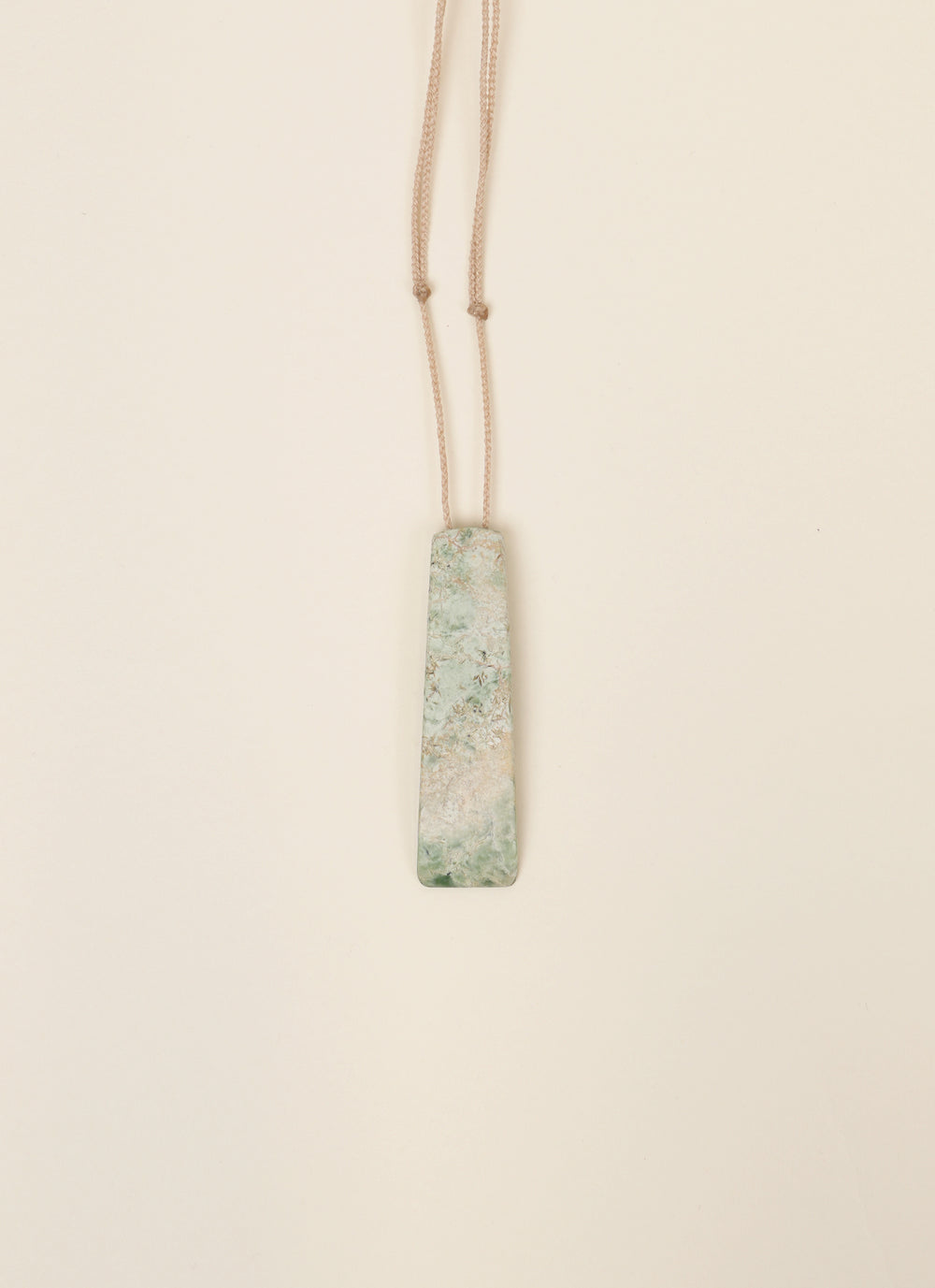 Changing Tides Hydrogrossular Garnet Taonga Pendant