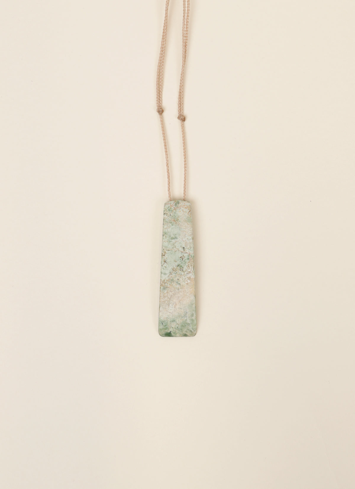 Changing Tides Hydrogrossular Garnet Taonga Pendant