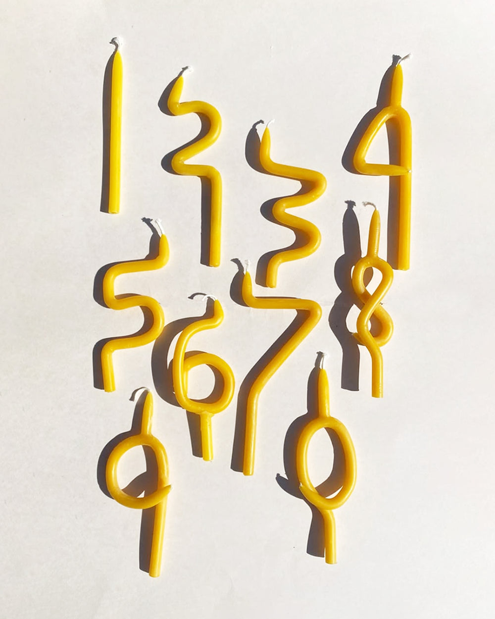 Poppy and Sage number and Squiggle candles